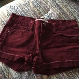 Maroon shorts from a Tilly’s brand